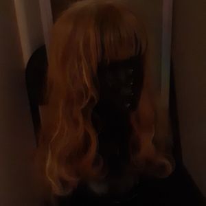 Brand new auburn and blonde longe curly wig
